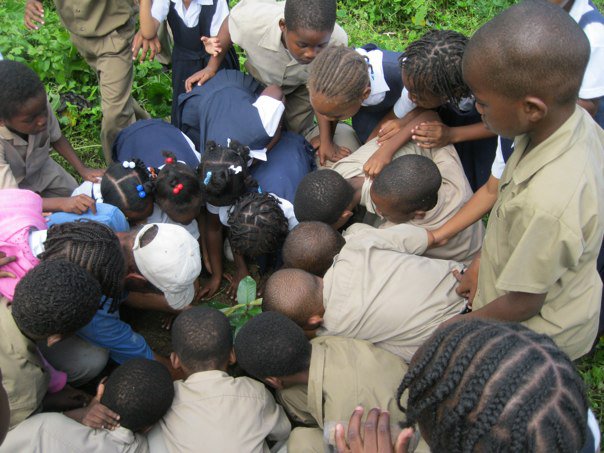 Kids lovin' planting